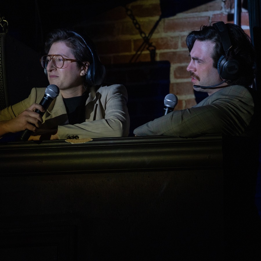 Commentators in the broadcast booth